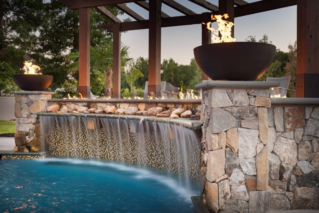 Water and Fire Features and a Pavillion/Pergola support a lush poolscape